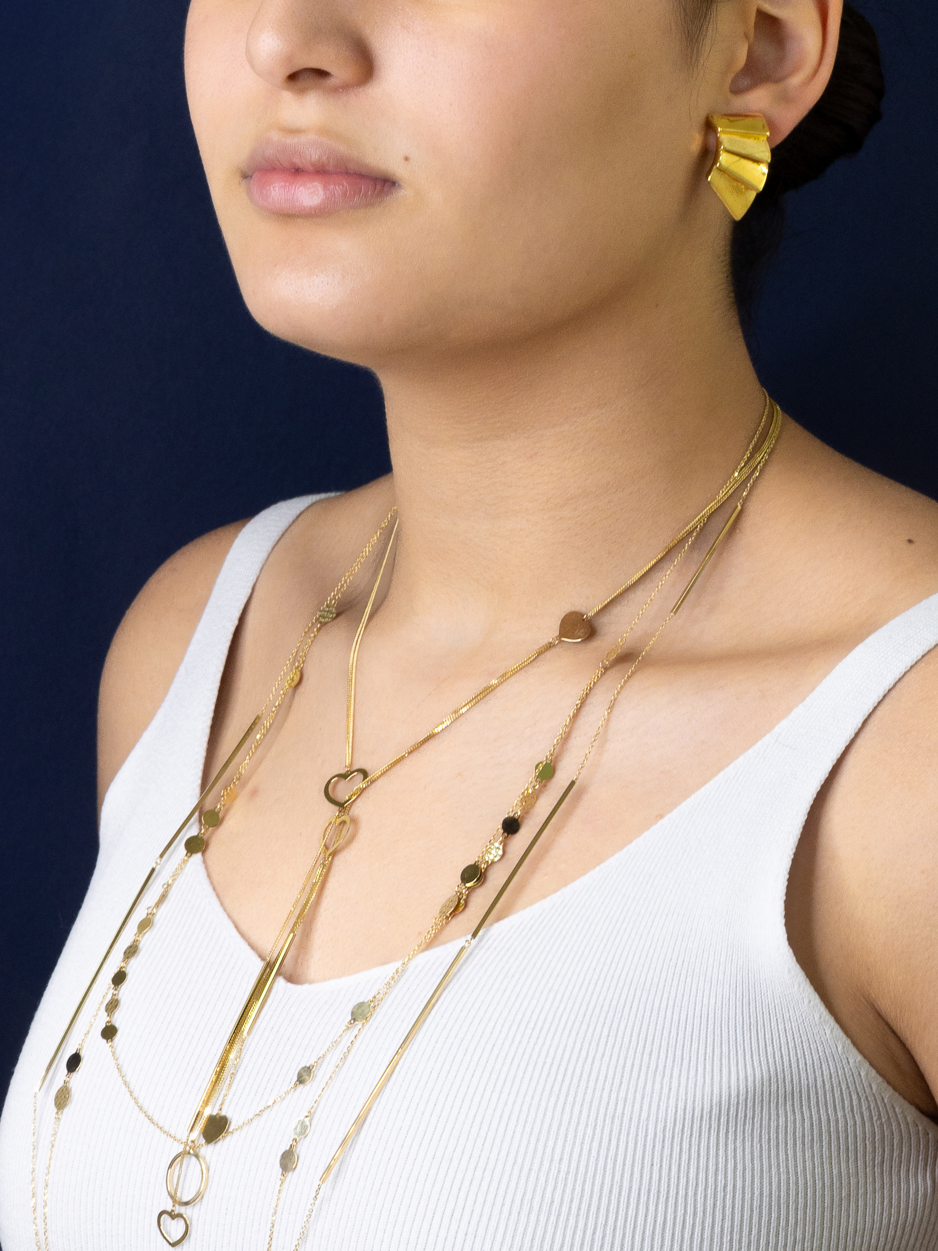 Modelo con collar BP Fancy — oro